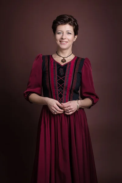 Young woman portrait in red dress — Stock Photo, Image