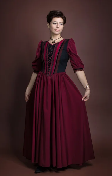 Young woman portrait in red dress — Stock Photo, Image