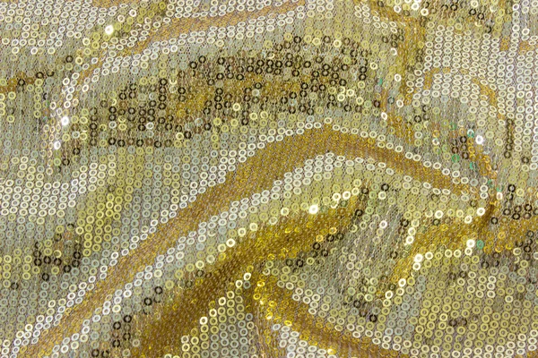 Fabric texture with reflective gold rings with pleats — Stock Photo, Image
