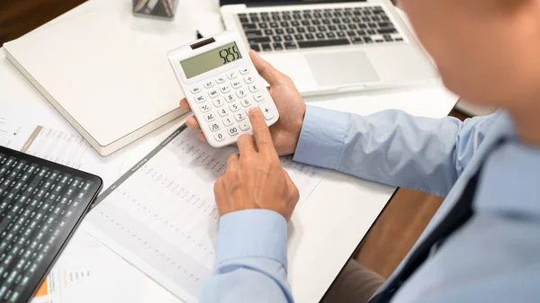 Working Man Conept Male Officer Sitting His Desk Holding Calculator — Stockfoto