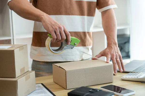 Online Shopping Concept Shop Seller Sealing Parcel His Goods Desk — Stock Photo, Image