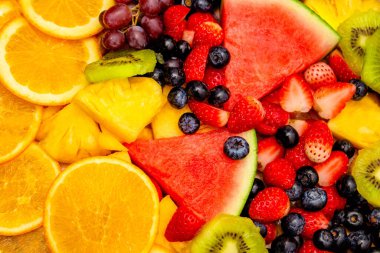 Taze meyve arka planı, sağlıklı karışık meyveler tropikal meyve ve çeşitli meyvelerden oluşur..