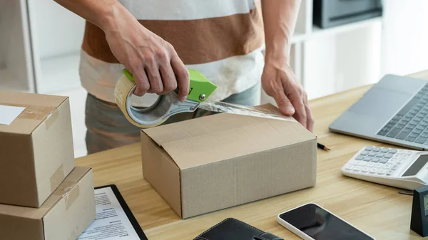 Online Shopping Concept Shop Seller Sealing Parcel His Goods Desk — Stock Photo, Image