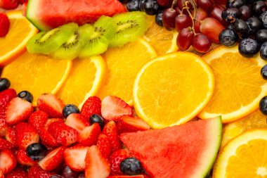 Taze meyve arka planı, sağlıklı karışık meyveler tropikal meyve ve çeşitli meyvelerden oluşur..