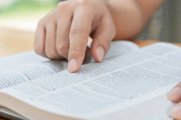 Pray and religion concept, Female christian read holy bible to studying of faith and spirituality.