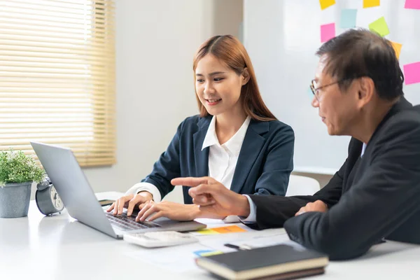 Business Partnership Concept Businesswoman Typing Laptop While Senior Point Explain — Foto de Stock