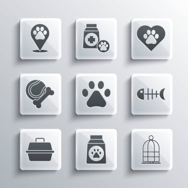 Yiyecek seti, kuşlar için kafes, balık iskeleti, pençe izi, hayvan taşıma çantası, oyuncak kemik kauçuk ve top, hayvanların ayak izi ikonlu konum veterineri ve kalp. Vektör