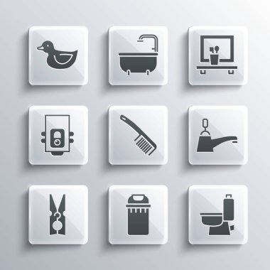 Çöp tenekesi, klozet, su musluğu, saç fırçası, mandal, gaz kazanı, plastik ördek ve lavabo aynası ikonu. Vektör