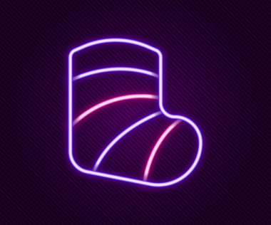 Parlayan neon çizgisi alçıtaşı siyah arka planda izole edilmiş tıbbi sağlık kırık bacak ikonu. Renkli taslak konsepti. Vektör