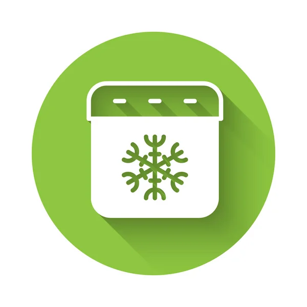 White Calendar Winter Ikone isoliert mit langem Schatten Hintergrund. Erinnerungssymbol. Grüner Kreis-Knopf. Vektor — Stockvektor