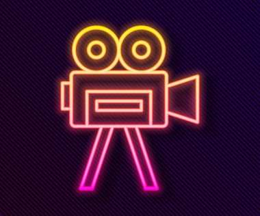Parlayan neon hattı Retro sinema kamera ikonu siyah arkaplanda izole edildi. Video kamera. Film tabelası. Film projektörü. Vektör