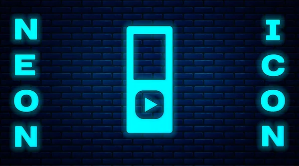 Glödande neon Musik spelare ikon isolerad på tegel vägg bakgrund. Bärbar musikapparat. Vektor — Stock vektor