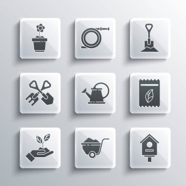 Set Wheelbarrow with dirt, Bird house, Pack full of seeds of plant, Watering can, Plant hand environmental, Shovel rake, Flower pot and the ground icon. Vector