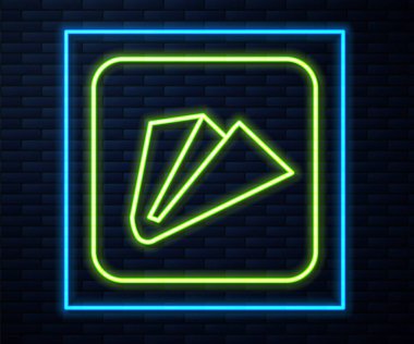 Parlayan neon çizgili kağıt uçak ikonu tuğla duvar arka planında izole edilmiş. Vektör