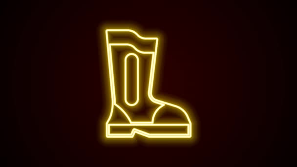 Glowing neon line Fire boots icon isolated on black background. 4K Video motion graphic animation — Stock Video