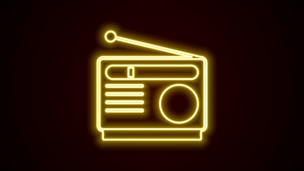 Leuchtendes Neon Line Radio mit Antennensymbol isoliert auf schwarzem Hintergrund. 4K Video Motion Grafik Animation — Stockvideo