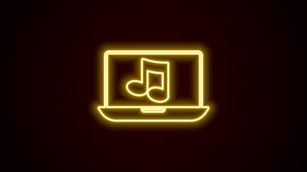 검은 배경에 고립된 화면 아이콘에 음악 표시가 달린 네온 랩 탑 이 있다. 4K 비디오 모션 그래픽 애니메이션 — 비디오
