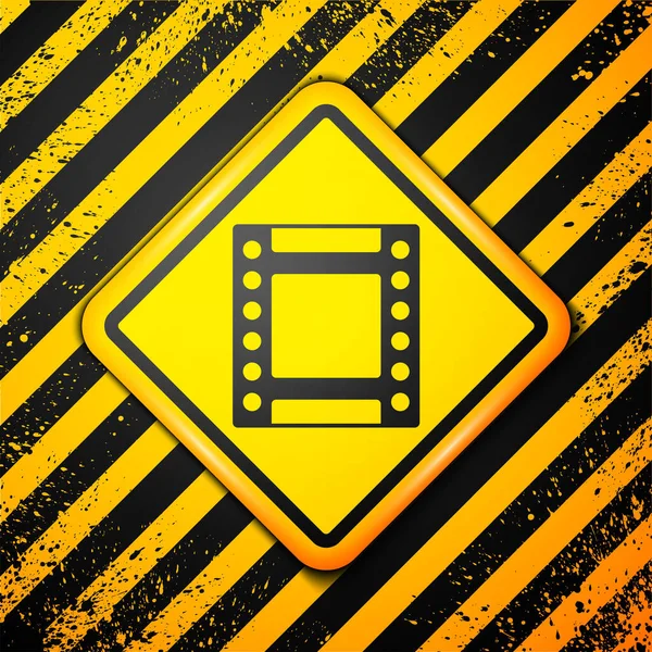 Ícone de cartucho de rolo de filme vintage de câmera preta isolado no fundo amarelo. Caixote de filme de 35mm. Filmstrip equipamento de fotógrafo. Sinal de aviso. Vetor — Vetor de Stock