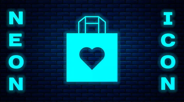 Glowing Neon Shopping Bag Heart Icon Isolated Brick Wall Background — Stock vektor
