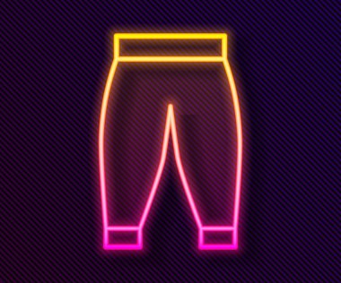 Glowing neon line Pants icon isolated on black background. Trousers sign. Vector.