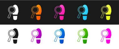 Siyah ve beyaz arkaplanda izole edilmiş ayak izi simgesi olan büyüteç ayarla. Dedektif araştırıyor. Ayak izlerini takip etmek için. Vektör.