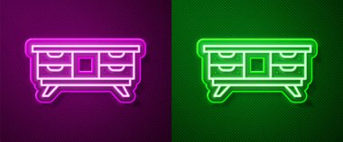 Glowing neon line TV table stand icon isolated on purple and green background. Vector.