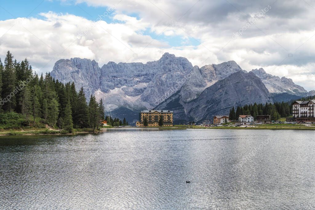 the view of lake misurina and mount sorapiss taken during summer. Famous landmark in Dolomite, Italy.