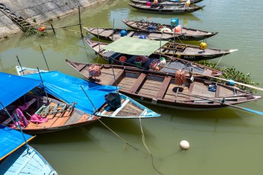 Hoi An Thu Bon River Boats floating on the river bank. Hoi An, Vietnam