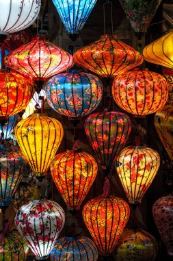 Brightly lit lanterns in Hoi An Night Market hanging above. Taken in Hoi An, Vietnam.