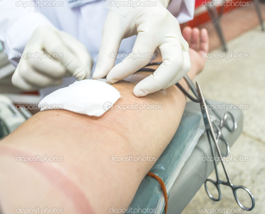 Close up of a patient transfused blood in hospital  