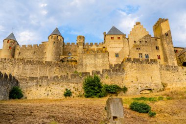 Batan güneşin ışığında Antik Carcassonne Kalesi. Fransız Kalesi. Yüksek kalite fotoğraf