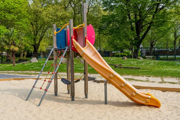 Playground slide in the park. High quality photo