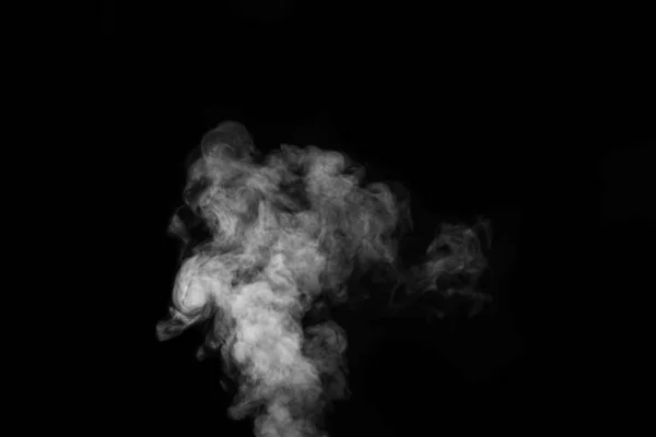 Fragmento de fumaça de vapor encaracolado quente branco isolado em um fundo preto. Criar místicas fotos de Halloween. — Fotografia de Stock