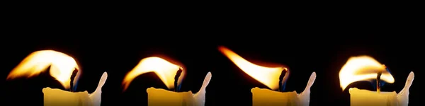 Conjunto de chamas de velas isoladas em fundo preto, uma coleção de quatro imagens para sobrepor em suas fotos. — Fotografia de Stock