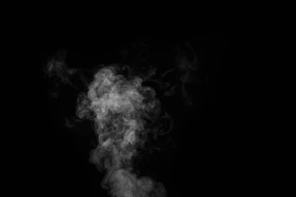 Fragmento de humo de vapor rizado caliente blanco aislado sobre un fondo negro. Crear fotos místicas de Halloween. —  Fotos de Stock