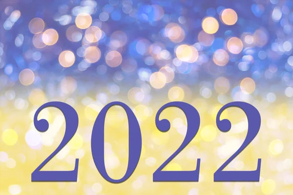 Very Peri color of the year 2022 and date 2022 on a gradient background with bright yellow and lilac color with bokeh — Stock Photo, Image