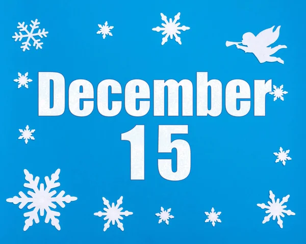 12月15日 雪の結晶 天使とカレンダーの日付と冬の青の背景 月の15日 冬の月 その年のコンセプトの日 — ストック写真