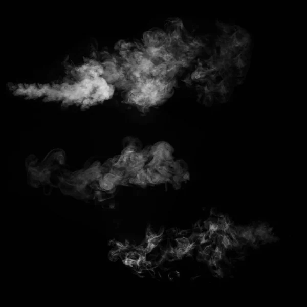 White smoke collection on black background. Fog or smoke set isolated on black background. White cloudiness, mist or smog background. — Stock Photo, Image