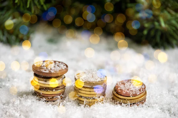 Gold Pyramids Coins Covered Snow Background Green Spruce Branches Bokeh — Stock Photo, Image