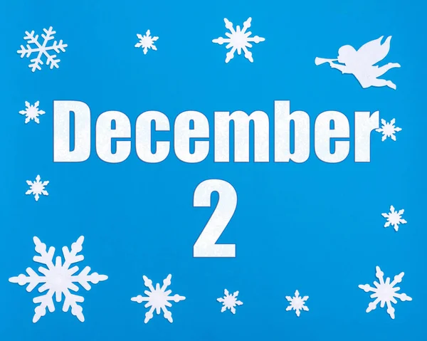 12月2日冬季蓝色背景 天使和一个日历日期 月2日 冬季月 年月日概念 — 图库照片