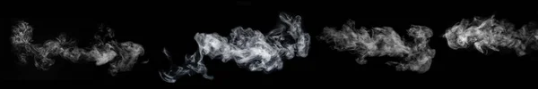 Un conjunto de cuatro tipos diferentes de remolino, retorciéndose humo, vapor aislado sobre un fondo negro para la superposición en sus fotos —  Fotos de Stock