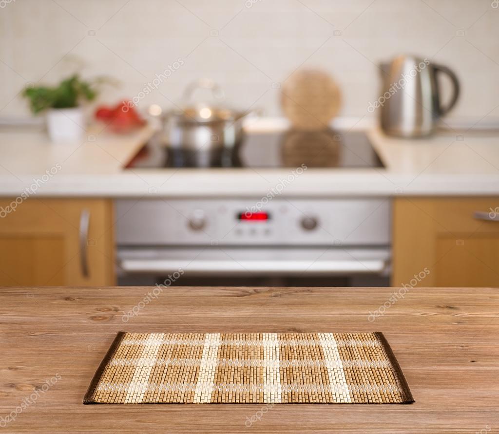 Wooden table on defocused kitchen bench background — Stock ...