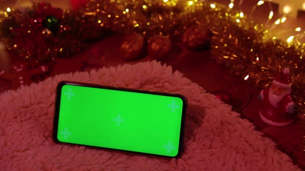 Pnone pantalla verde. Concepto de Navidad — Vídeo de stock