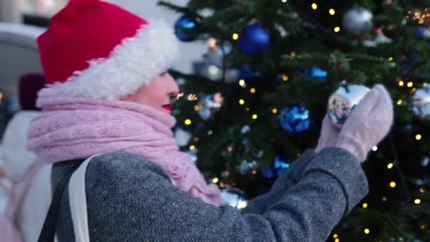 Close up female portrait. Happy woman smiling and relax outdoor. Christmas time. — Stock Video