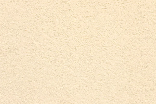 Açık sarı ya da bej desenli sıva kaplama arka plan. Duvar dokusu.