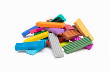 Colorful plasticine modelling clay sticks isolated on white background with clipping path. 24 colors set. Front view, closeup heap.