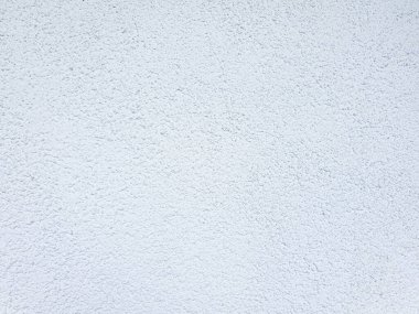 Beyaz, pürüzlü duvar dokusu arka planı. Duvarda dekoratif alçı.