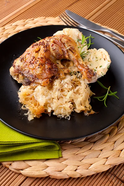 Roast chicken with cabbage and dumplings — Stock Photo, Image