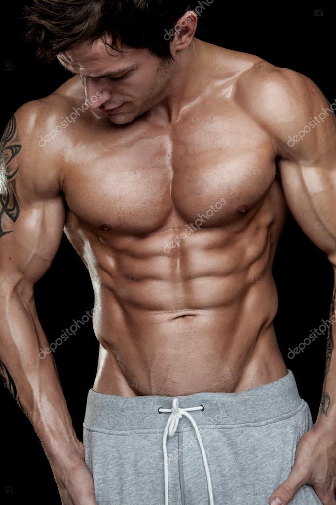 Strong Athletic Man Fitness Model Torso showing six pack abs. Stock Photo  by ©_italo_ 49796249