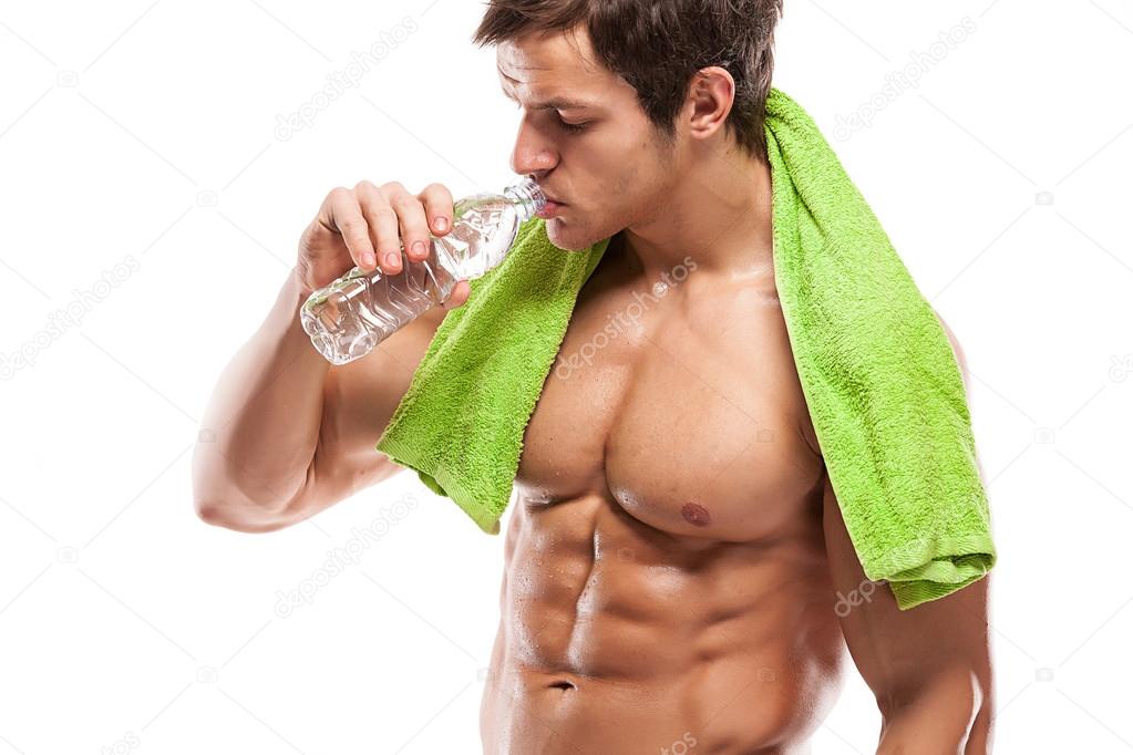 Strong Athletic Man Fitness Model drinking fresh water over whit